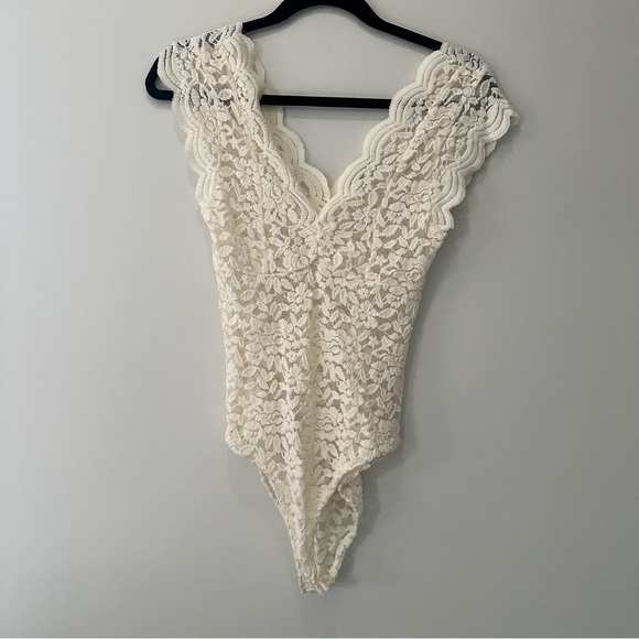 Zara Tops - Zara white lace V neck snap bottom bodysuit size small